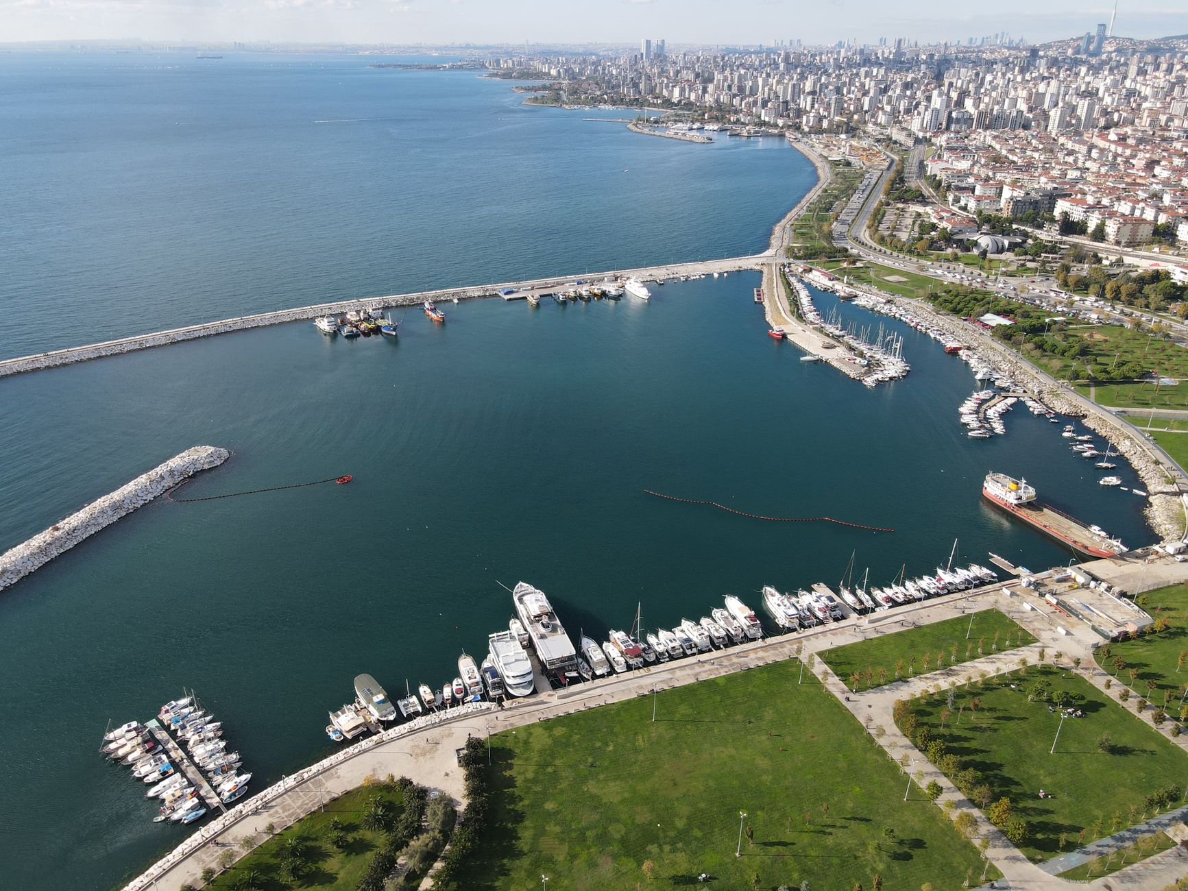 Aerial shot of a marina with yachts in Istanbul, Turkey, showcasing the skyline and sea. — Baji999 Mobile Casino: Gaming on t